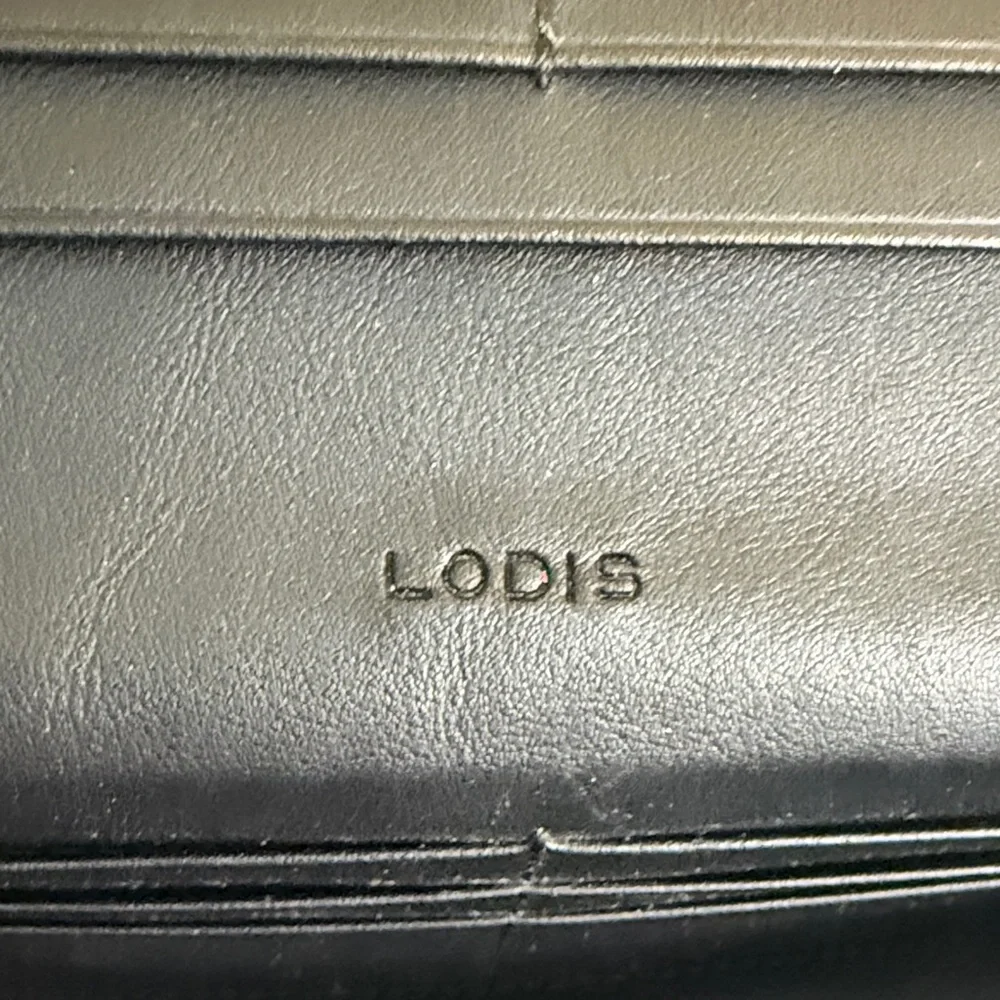 Lodis Magenta Genuine Leather Bifold snap closing Clutch Wallet